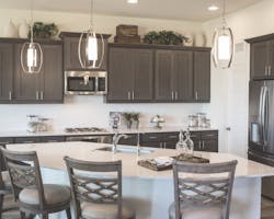 in Trendmaker Homes' design at Rancho Sienna, the kitchen offers Texas Hill Country charm in Trendmaker Homes' design at Rancho Sienna, the kitchen offers Texas Hill Country charm