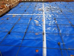 An example of underslab vapor barrier correctly installed An example of underslab vapor barrier correctly installed