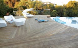 Thermory modified wood ash decking by the pool Thermory modified wood ash decking by the pool