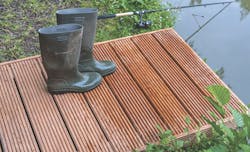 Lignia modified wood alternative to pressure treated lumber used on a deck by the water Lignia modified wood alternative to pressure treated lumber used on a deck by the water