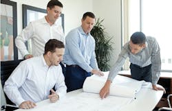 2019 Builder of the Year The New Home Company team at work reviewing plans 2019 Builder of the Year The New Home Company team at work reviewing plans