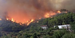 forest fire threatening homes forest fire threatening homes