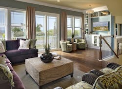 living room takes in the view in the Sunset Inlet design by The Evans Group living room takes in the view in the Sunset Inlet design by The Evans Group