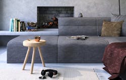 home fireplace in gray-toned interior with sofa and side table home fireplace in gray-toned interior with sofa and side table