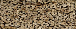 stacked firewood for burning in a fireplace stacked firewood for burning in a fireplace