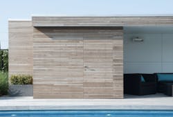 Thermory PaCS press-and-click-wood siding exterior by pool Thermory PaCS press-and-click-wood siding exterior by pool