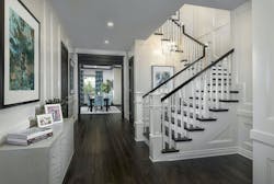 Open floor plan home design with winding staircase Open floor plan home design with winding staircase