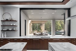 Nyumbani luxury spec home view from kitchen to outdoor entertaining area Nyumbani luxury spec home view from kitchen to outdoor entertaining area