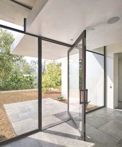 Hope's Windows' Jamestown175 pivot door is hurricane-rated Hope's Windows' Jamestown175 pivot door is hurricane-rated