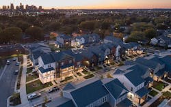 Aerial view of Kirkpatrick Park multifamily development, Nashville, at dusk Aerial view of Kirkpatrick Park multifamily development, Nashville, at dusk