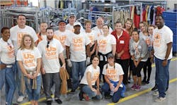 A group of volunteers from True Homes volunteer to help the homeless A group of volunteers from True Homes volunteer to help the homeless