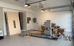 The New American Home 2021 elevator staging in garage The New American Home 2021 elevator staging in garage