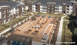 Outdoor common space in multifamily housing development Outdoor common space in multifamily housing development