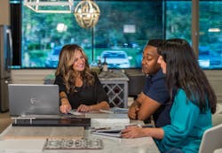 Jane Meagher with clients in design studio Jane Meagher with clients in design studio