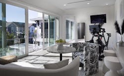 The New American Home 2022 lounge and fitness room The New American Home 2022 lounge and fitness room