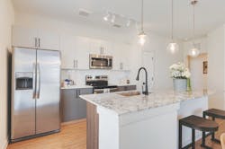 Hermosa Village multifamily rental development kitchen interior Hermosa Village multifamily rental development kitchen interior