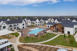 Hermosa Village multifamily rental development aerial view of amenities, pool, and clubhouse Hermosa Village multifamily rental development aerial view of amenities, pool, and clubhouse