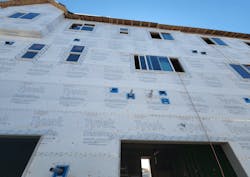 Unperforated housewrap installed on a home exterior Unperforated housewrap installed on a home exterior