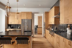 The kitchen and view to the back kitchen in DTJ Design's Westerly Premier Collection, Plan 6150 The kitchen and view to the back kitchen in DTJ Design's Westerly Premier Collection, Plan 6150