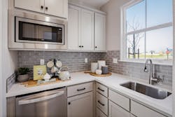 Signature Homes kitchen corner niche design in a multigenerational suite Signature Homes kitchen corner niche design in a multigenerational suite