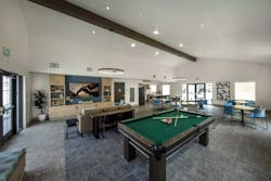 Community center interior at Buena Esperanza, an adaptive reuse motel to housing conversion Community center interior at Buena Esperanza, an adaptive reuse motel to housing conversion