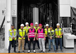 Construction people in front of 3D construction printer Construction people in front of 3D construction printer