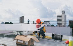 Solar Technician Installing Solar Panel Solar Technician Installing Solar Panel