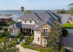 Westlake DaVinci Roofscapes’ Multi-Width Slate composite roofing on European-styled home Westlake DaVinci Roofscapes’ Multi-Width Slate composite roofing on European-styled home