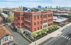 Exterior aerial view of Peabody School Apartments, an adaptive reuse project in Chicago and 2023 BALA winner Exterior aerial view of Peabody School Apartments, an adaptive reuse project in Chicago and 2023 BALA winner