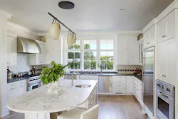 Kitchen in Hamptons Home by the Turett Collective Kitchen in Hamptons Home by the Turett Collective
