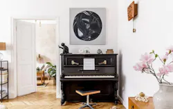 Piano in all-white room Piano in all-white room