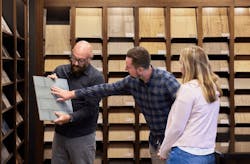 Pro Builder's 2023 Builder of the Year, Schell Brothers, showing customers materials selections in the design center Pro Builder's 2023 Builder of the Year, Schell Brothers, showing customers materials selections in the design center