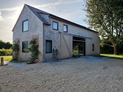 John Barrows of P3 Builder Group used passive house technology to build this ultra energy-efficient home, which also has two Tesla charging stations. Photo courtesy John Barrows John Barrows of P3 Builder Group used passive house technology to build this ultra energy-efficient home, which also has two Tesla charging stations. Photo courtesy John Barrows