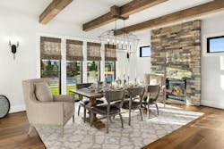 Elegant dining space with fireplace featuring Echo Ridge Country Ledgestone from Cultured Stone Elegant dining space with fireplace featuring Echo Ridge Country Ledgestone from Cultured Stone