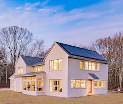 Clean lines and vertical TruExterior siding highlight this Modern Farmhouse designed by Michael McKinley and Associates, LLC. Photo: Jason McGrail Clean lines and vertical TruExterior siding highlight this Modern Farmhouse designed by Michael McKinley and Associates, LLC. Photo: Jason McGrail