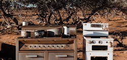 Old gas stove in desert stock image Old gas stove in desert stock image