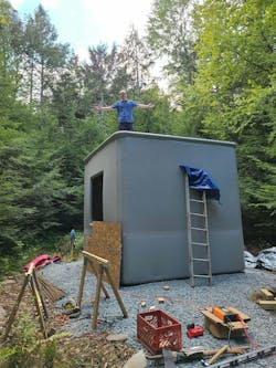 Inflatable house ADU with man on top Inflatable house ADU with man on top