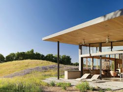 A corner view of the open Caterpillar house and patio A corner view of the open Caterpillar house and patio