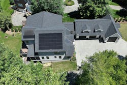 Solar panels on top of single-family healthy home Solar panels on top of single-family healthy home