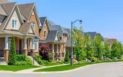 A row of homes in a residential neighborhood A row of homes in a residential neighborhood