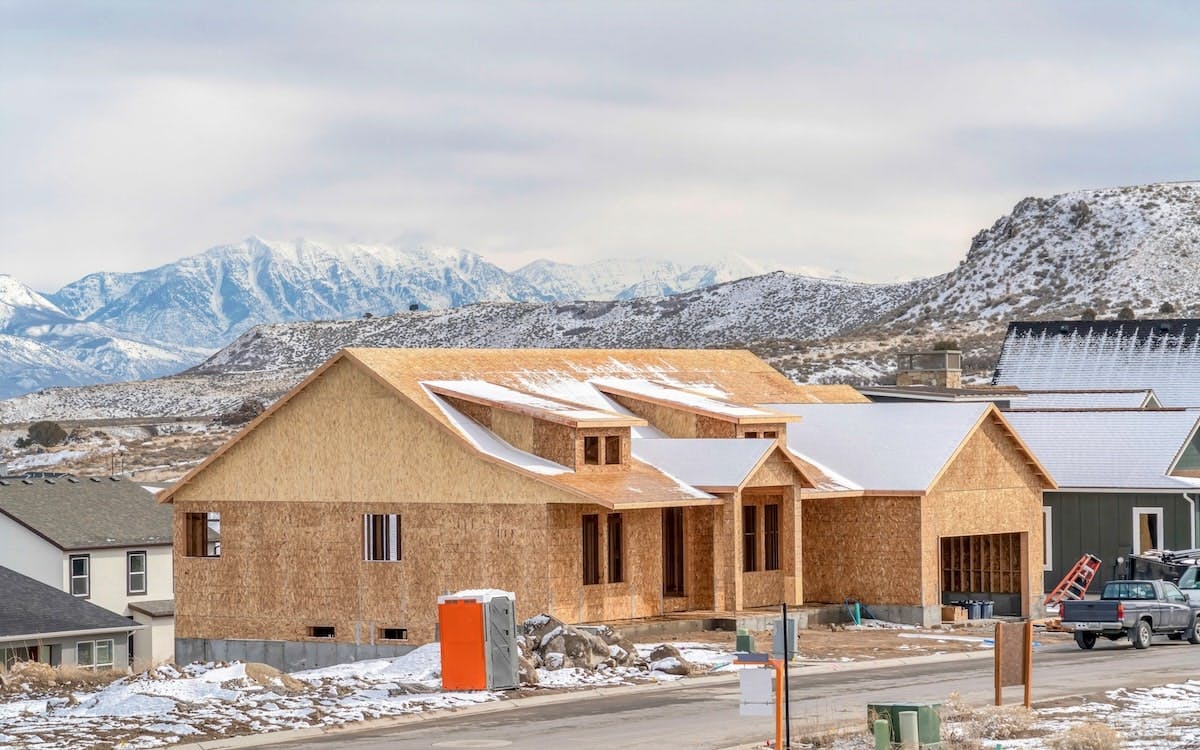 A single-family home under construction in the Utah mountains