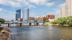 View of the Blue Bridge with Grand Rapids, Mich., skyline behind it