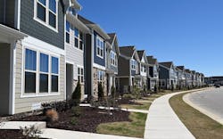 A row of homes in a new housing development A row of homes in a new housing development
