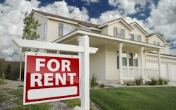 A single-family home that has a red 'For Rent' sign in the front yard A single-family home that has a red 'For Rent' sign in the front yard
