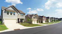 A row of newly built homes in a suburban neighborhood