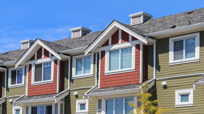 A close-up view of a row of townhomes