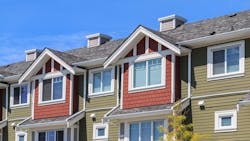 A close-up view of a row of townhomes A close-up view of a row of townhomes