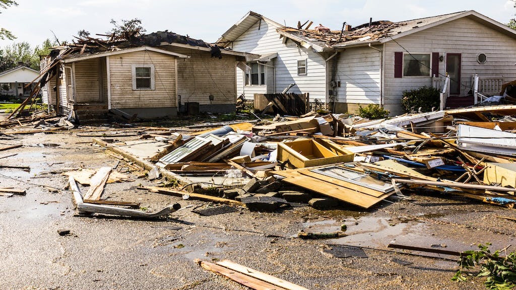 A home with roof damage from a tornado