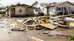A home with roof damage from a tornado