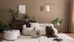 An organic modern living room, with warm brown walls, wooden dresser, large floor lamp, and white couch An organic modern living room, with warm brown walls, wooden dresser, large floor lamp, and white couch